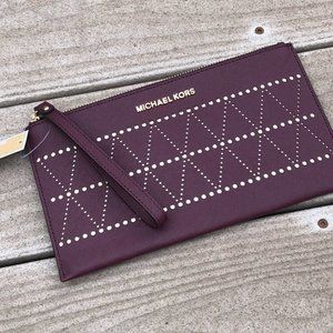 Authentic NWT Michael Kors perforated wristlet